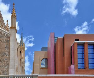 Low angle view of building against blue sky
