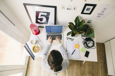 Woman working in home office