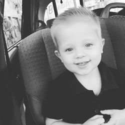 Portrait of smiling boy at home