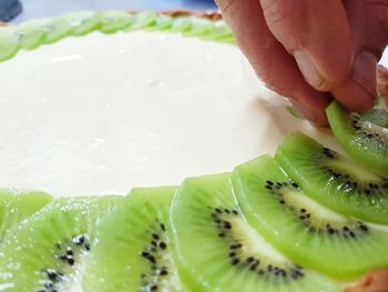 Close-up of hand holding fruit