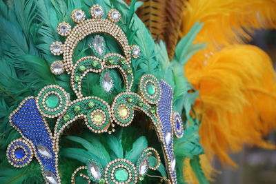 Close-up of multi colored feathers for sale in market