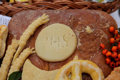 High angle view of text on dough over cutting board