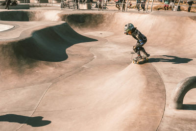 High angle view of man skateboarding on skateboard