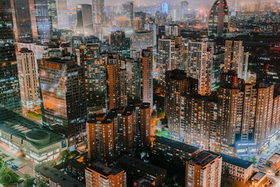 High angle view of illuminated cityscape