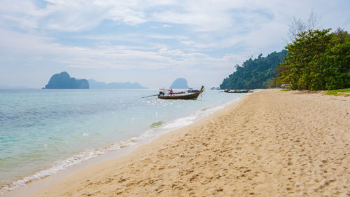 Scenic view of beach against sky