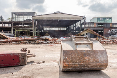 Abandoned construction site against sky