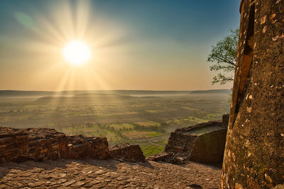 View of landscape against sky during sunset