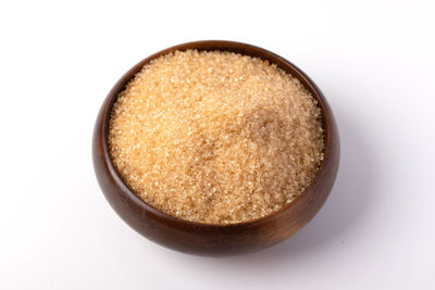 High angle view of bread in bowl against white background