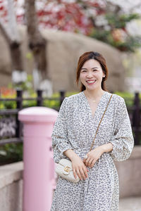 Portrait of a smiling young woman