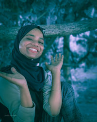 Portrait of a smiling young woman