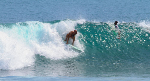 Man surfing in sea