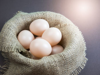 High angle view of eggs in container on table