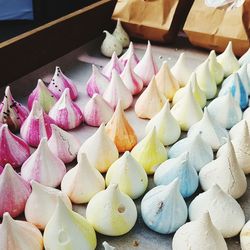 High angle view of meringues on table at bakery