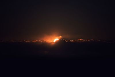 Scenic view of silhouette mountains against sky during sunset