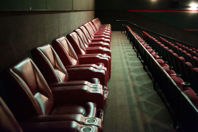 High angle view of empty chairs at table