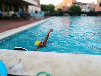 Close-up of toy floating on swimming pool