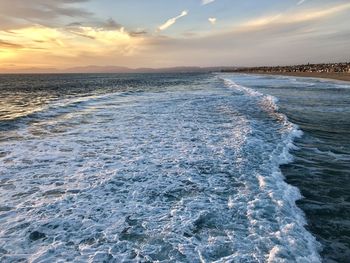 Scenic view of sea against sky during sunset