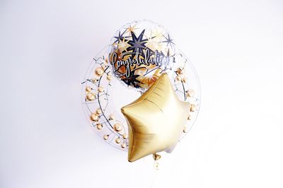 High angle view of decoration on white background
