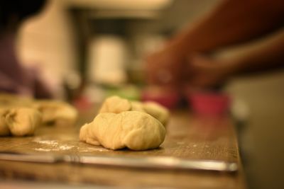 Close-up of person preparing food