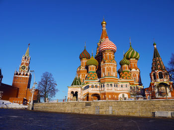 Low angle view of building against blue sky