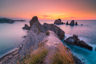 Scenic view of sea against sky during sunset