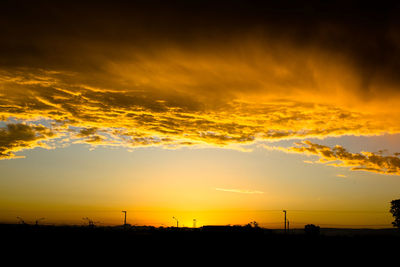 Scenic view of dramatic sky during sunset