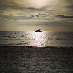 Scenic view of sea at sunset