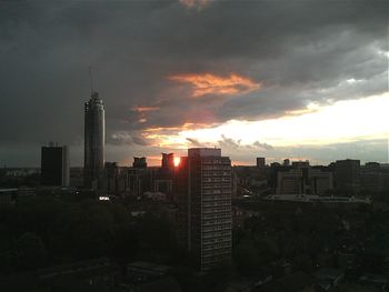 View of cityscape against sky at sunset