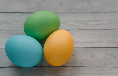 Close-up of eggs on wooden table