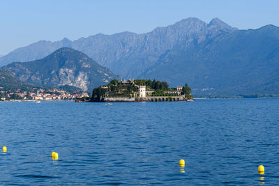 Scenic view of sea against mountain