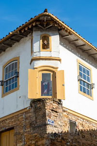 Low angle view of old building against sky