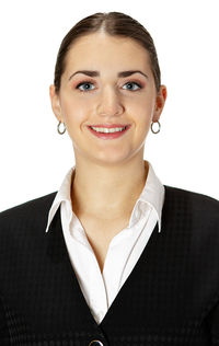 Portrait of a smiling young woman over white background