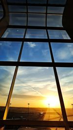 Low angle view of silhouette built structure against sky