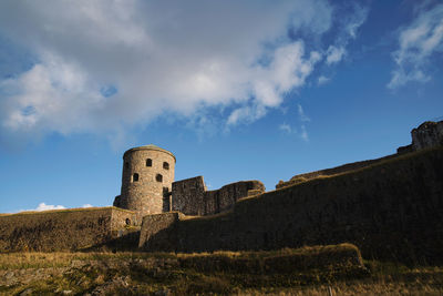 Low angle view of historic building against sky