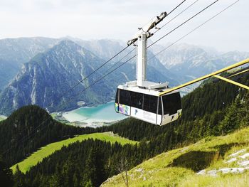 Overhead cable car over mountains