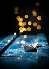 Close-up of illuminated string lights on table