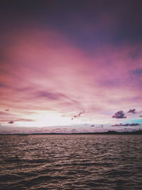 Scenic view of sea against sky at sunset