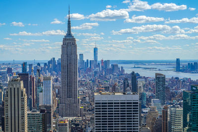 Modern buildings in city against sky