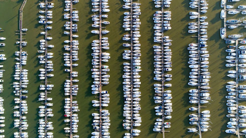 Aerial view of boats in sea at harbor