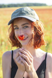 Portrait of young woman with eyes closed