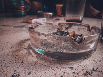 Close-up of cigarette on table