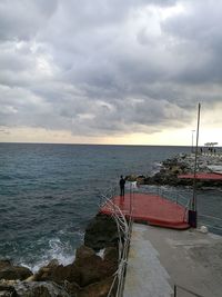 Scenic view of sea against dramatic sky