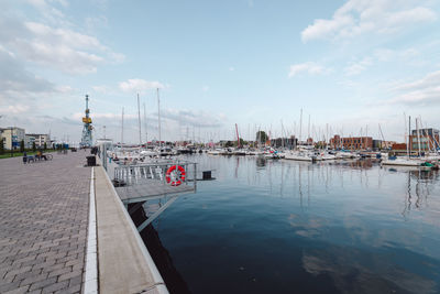 Boats moored at harbor