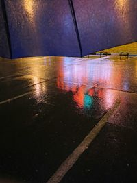 High angle view of wet road at night