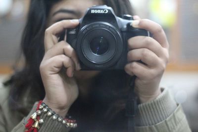 Midsection of man photographing