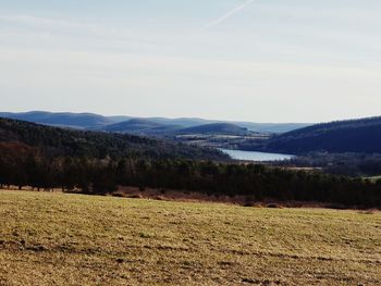 Scenic view of field against sky