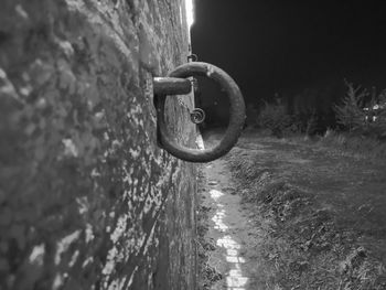 Close-up of chain on wall