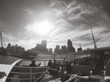 View of people in cropped boat