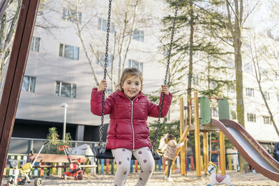 Portrait of happy girl on playground