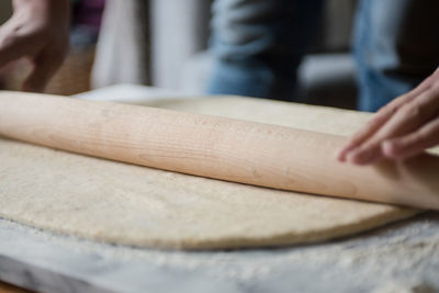 Cropped image of person preparing food